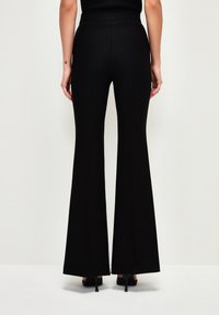 adL ELASTIC WAITED  - Broek - black