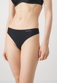 Calvin Klein Underwear THONG INVISIBLES 3 PACK - String - black/black/black