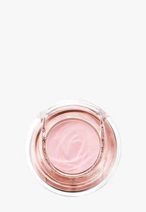 Läpinäkyvä pyöreä purkki, jossa vaaleanpunaista kermaa ja kiemurainen kuvio, esitetty ylhäältä valkoisella taustalla.