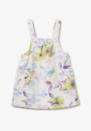 Peuterkleedje met brede schouderbanden, voorzien van een zachte pastel bloemenprint in geel, paars, blauw en roze op een witte achtergrond.