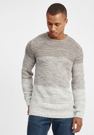 Lichtgewicht sweater met een gebreide textuur, met een kleurverloop van donkerbruin naar crème. Ronde halslijn en geribde manchetten.