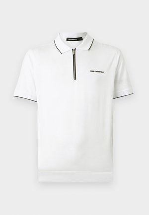 Tricou polo alb cu mâneci scurte, cu margini negre la guler și la mâneci, fermoar negru în față și mic logo "Karl Lagerfeld" pe piept.
