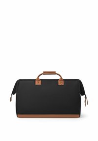 Sac de voyage en tissu noir avec des accents en cuir marron, présentant une poignée supérieure, une forme arrondie et des fermetures zippées de chaque côté.
