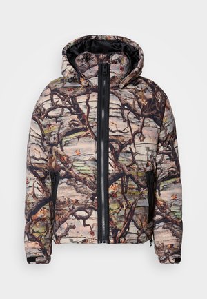 Padded camouflage jacket featuring a tree branch pattern, black zipper, and a hood. Material appears textured and warm, suitable for outdoor wear.
