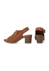 Braune Leder- offene Slingback-Schuhe mit durchbrochenem Design, verstellbarem Riemen und geripptem Blockabsatz.