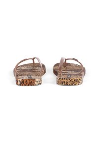 Brown flip-flops with a patterned footbed featuring leopard print in earthy tones. Thin straps with a smooth texture and a flat sole.
