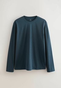 Long-sleeve shirt in dark blue cotton, featuring a round neckline, classic fit, and smooth texture. No visible patterns or accents.