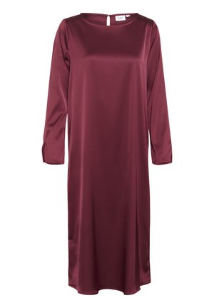 Bordeaux, lang mouwen jurk van glad satijn. Heeft een ronde halslijn en een sleutelgatluiting aan de achterkant. Eenvoudige, rechte silhouet.