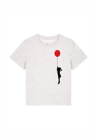 T-shirt gris à manches courtes avec une silhouette noire d'un enfant tenant un ballon rouge. Tissu doux avec un col rond.