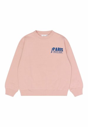 Różowa bluza z długimi rękawami, ściągaczami na mankietach i u dołu. Na lewej piersi znajduje się niebieski napis „PARIS SKATE SHOP”. Wykonana z miękkiej bawełny.