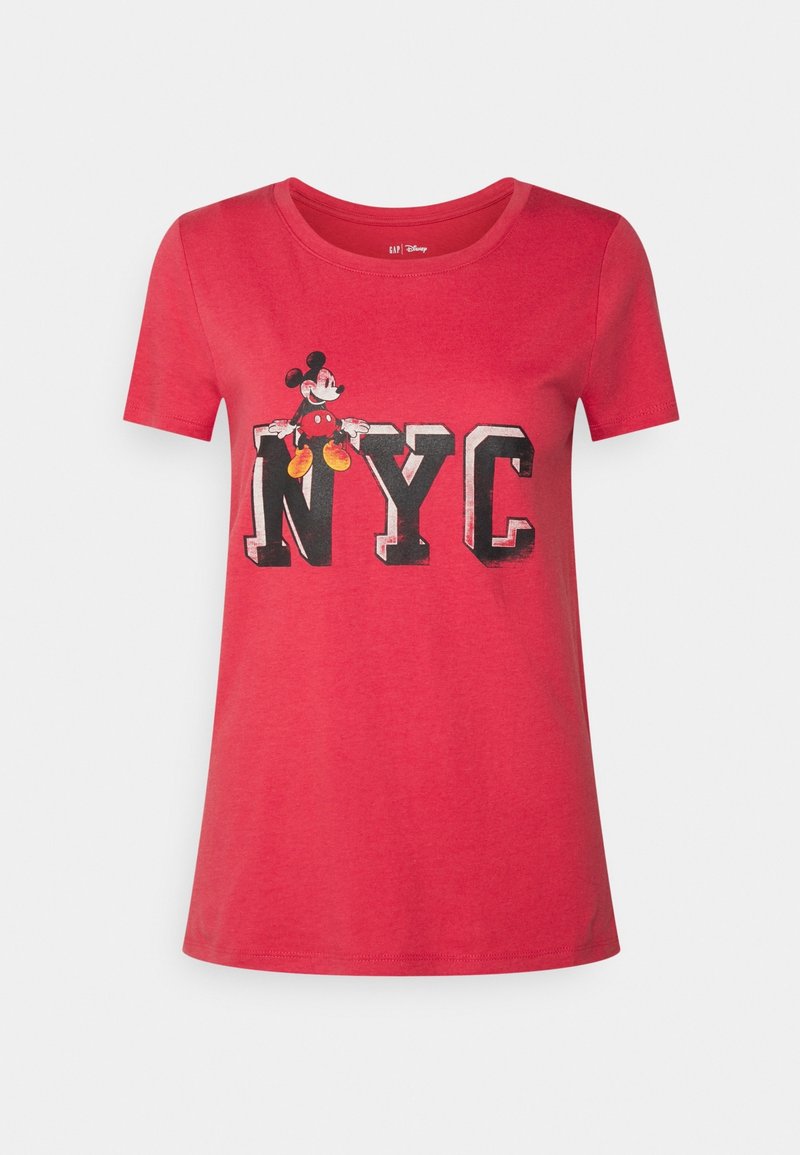 T-shirt en coton rouge avec un col rond. Présente "NYC" en lettres noires audacieuses et un graphisme de Mickey Mouse. Manches courtes, coupe régulière.