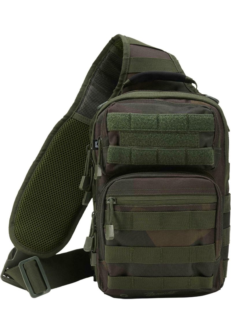 Green camouflage sling backpack featuring multiple zippered pockets, an adjustable strap, and a mesh back panel for ventilation.