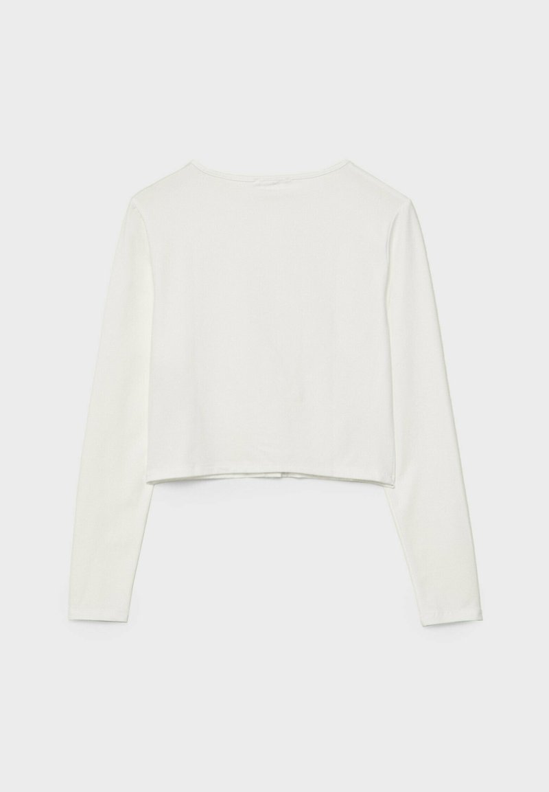 Maglia bianca cropped a maniche lunghe realizzata in tessuto morbido e elasticizzato. Presenta una scollatura rotonda e bordi puliti con una texture semplice e liscia.