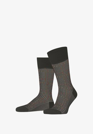 Par de meias até o meio da panturrilha com punhos, calcanhares e bicos pretos, apresentando um padrão de houndstooth cinza com pontos vermelhos e laranjas.