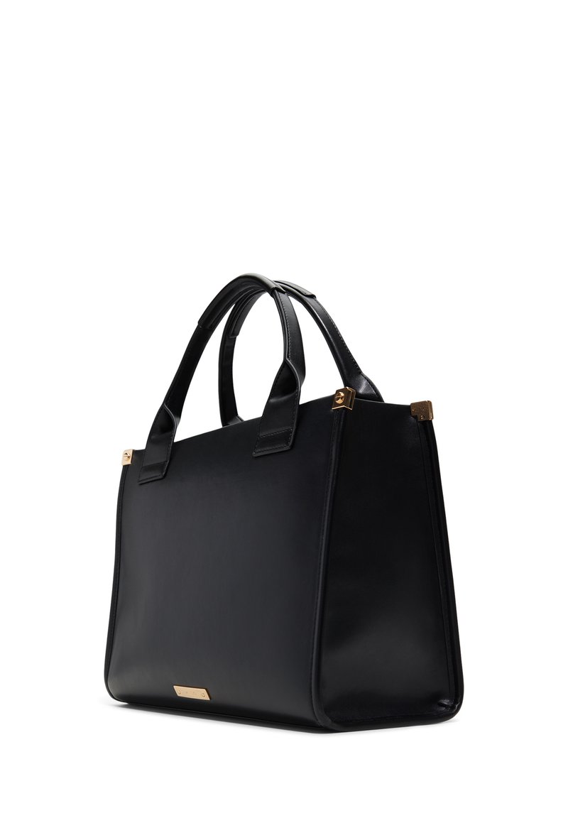 Sac fourre-tout en cuir noir avec une forme structurée, deux poignées supérieures et des accents en métal doré. Texture lisse avec un design minimal.