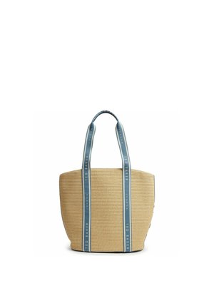 Sac cabas tissé beige avec deux poignées bleues présentant le texte "Ted Baker London" courant verticalement le long des bretelles.