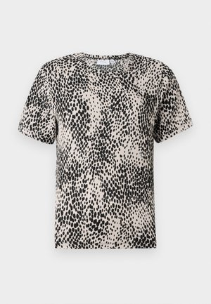 T-shirt à manches courtes en beige clair avec un motif à pois noirs, encolure ronde et texture douce. Coupe droite sans embellissements visibles.
