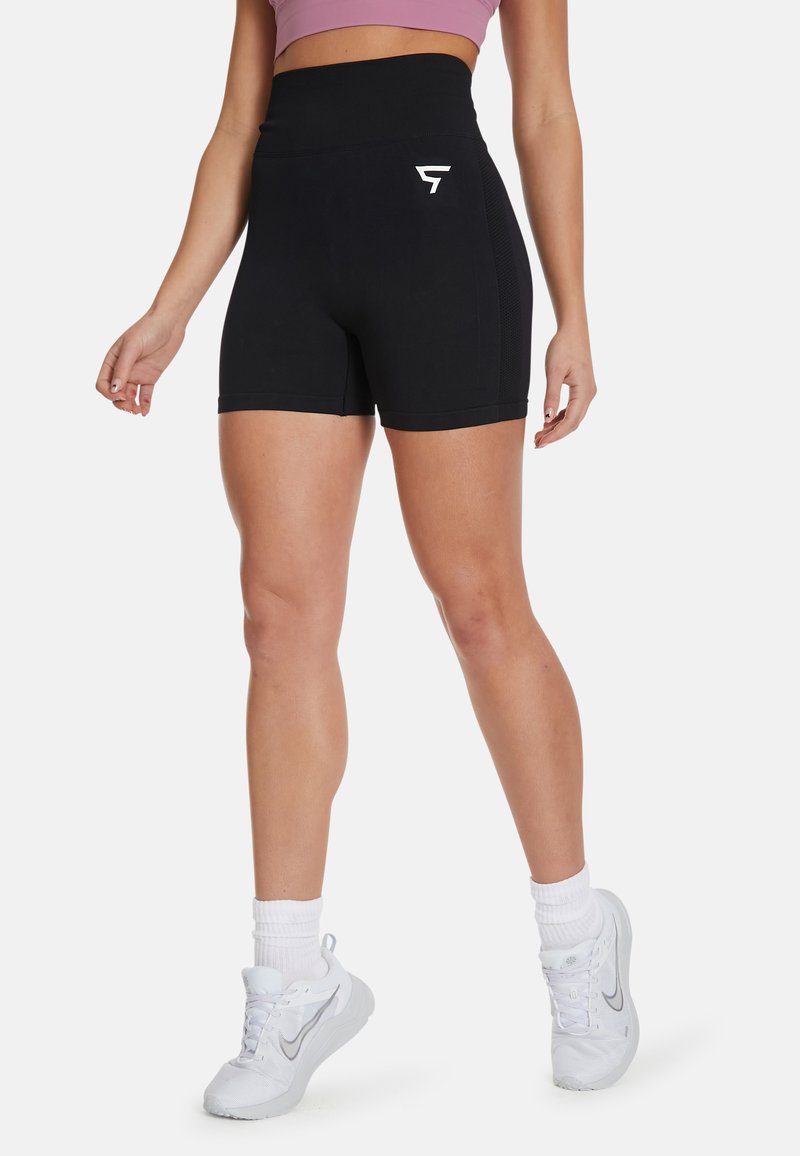 High-waisted black shorts with a smooth texture, contrasting logo on the left thigh, and breathable mesh paneling on the sides.