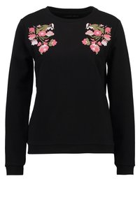 Sudadera negra de manga larga con bordado floral en rosa, blanco y verde en la zona del pecho. Textura suave con cuello redondo.
