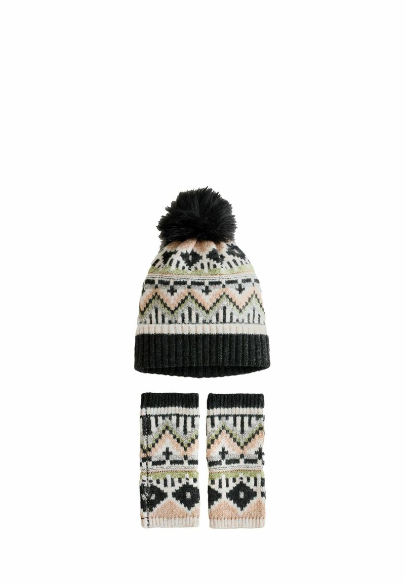 Gestrickte Mütze und passende Armwärmer in Schwarz, Creme, Grün und Pink, mit geometrischen Mustern und einem schwarzen Pompon auf der Oberseite der Mütze.