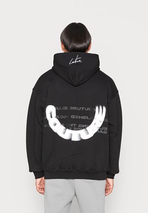 BACK PRINT TRAVEL SET HOODIE UNISEX - Sweat à capuche - black