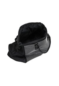 Geantă din material textil negru, cu un model texturat de puncte albe, închidere cu fermoar, două mânere și un interior negru spațios.
