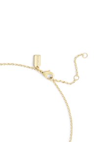 Gold-tone chain necklace with a lobster clasp closure and adjustable length. Features a rectangular tag with embossed logo.
