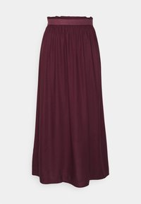 Jupe longue violette foncée avec taille froncée et large ceinture, en tissu fluide, avec un ourlet longueur sol.