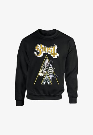 Svart hettegenser med grafisk design i gule detaljer, et skjelett og et kompassmotiv. Rund hals, middels tekstur og lange ermer.