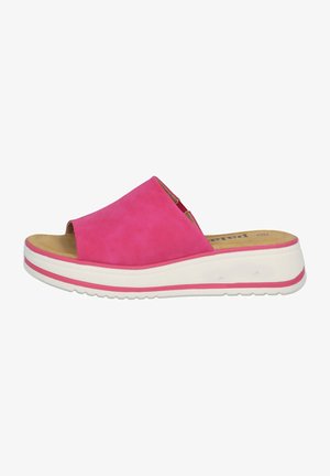 Rosa Wildleder-Sandale mit offener Zehe, weißer Plateau-Sohle und pinkem Akzentstreifen. Verfügt über ein komfortables Fußbett und ein minimalistisches Design.