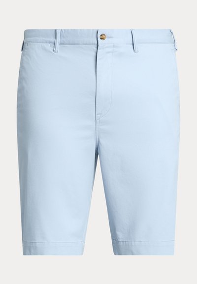 Light blue cotton shorts with a straight cut, a single button closure, and side pockets. Smooth texture and hemmed edges.