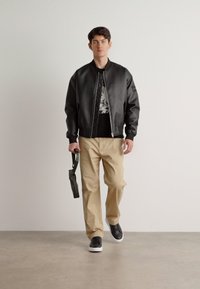 Calvin Klein TECH SENSUAL REPORTER UNISEX - Borsa a tracolla - dark olive