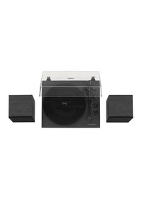 Black turntable with a clear acrylic cover, vinyl platter, tonearm, and two matching wooden speakers on either side.