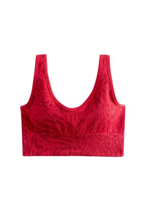 Reggiseno sportivo rosso con una sottile texture animalier e spalline larghe, progettato per supporto e comfort.