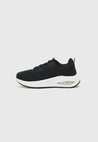 Black athletic sneaker with a textured knit upper, white midsole, and visible air cushioning detail. Features black laces and a pull tab.