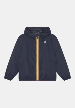 Námořnická lehká bunda s kapucí, žlutým zipem a bočními kapsami, vyrobená z hladké látky s elastickými manžetami.