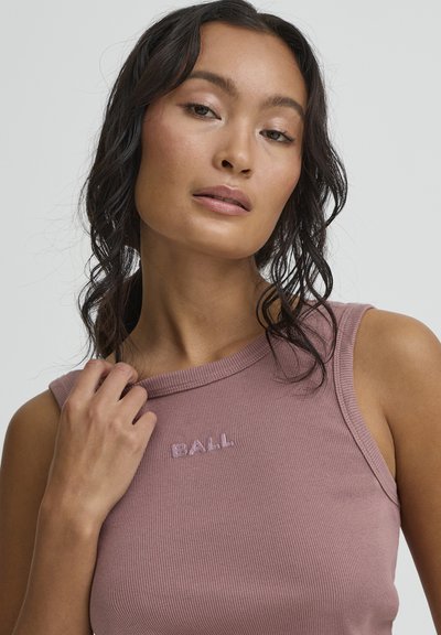 Pink ribbed tank top with rounded neckline. Features embroidered "BALL" logo on chest. Smooth texture and fitted design highlight silhouette.