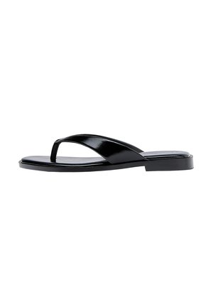 Black glossy leather thong sandal with flat sole and slightly raised heel, side view on white background.