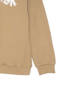 Felpa beige a maniche lunghe con polsini e orlo a costine, caratterizzata da una scritta grafica bianca parziale vicino all'area della spalla.