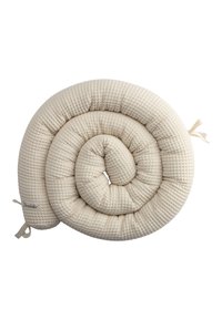 Rolled beige pillow with a textured, quilted fabric surface, featuring ribbon ties at one end for secure attachment.