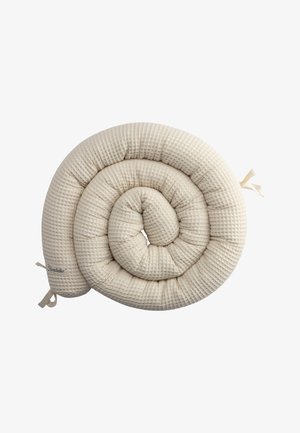 Rolled beige pillow with a textured, quilted fabric surface, featuring ribbon ties at one end for secure attachment.