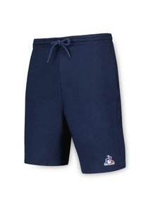 Marinblå shorts i en blandning av bomull och elastan, med elastisk midja och dragsko, sidofickor samt logodetalj vid fållen.