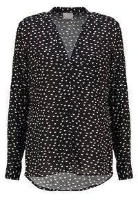 Svart knapp-up skjorta med ett mönster av vita halvcirklar, med långa ärmar, krage och rak nederkant för en avslappnad passform.