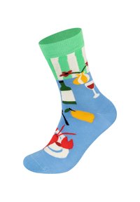 Modré ponožky se zeleným vroubkovaným lemem, které obsahují humra, citron, sklenici vína a pruhované objekty v různých barvách.