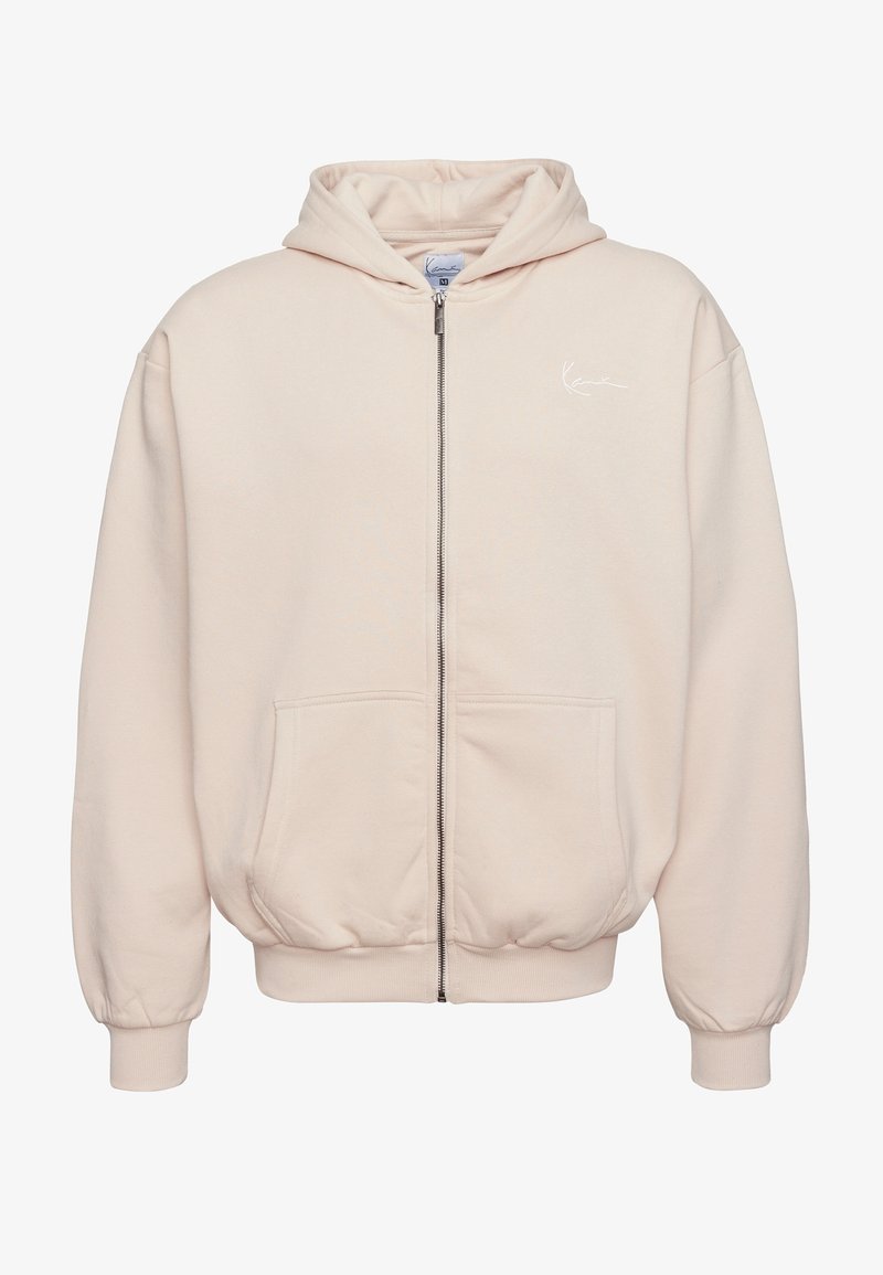 Felpa beige con zip, tasche frontali, polsini e orlo a costine, cappuccio e piccolo logo bianco in scritta sulla parte sinistra del petto.