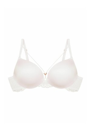 Light pink molded bra with lace detailing on the sides, thin adjustable straps, and a small gold accent at the center front.