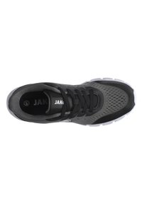Black athletic shoe with mesh upper, textured accents, and lace closure. Features a cushioned sole and white rubber outsole.