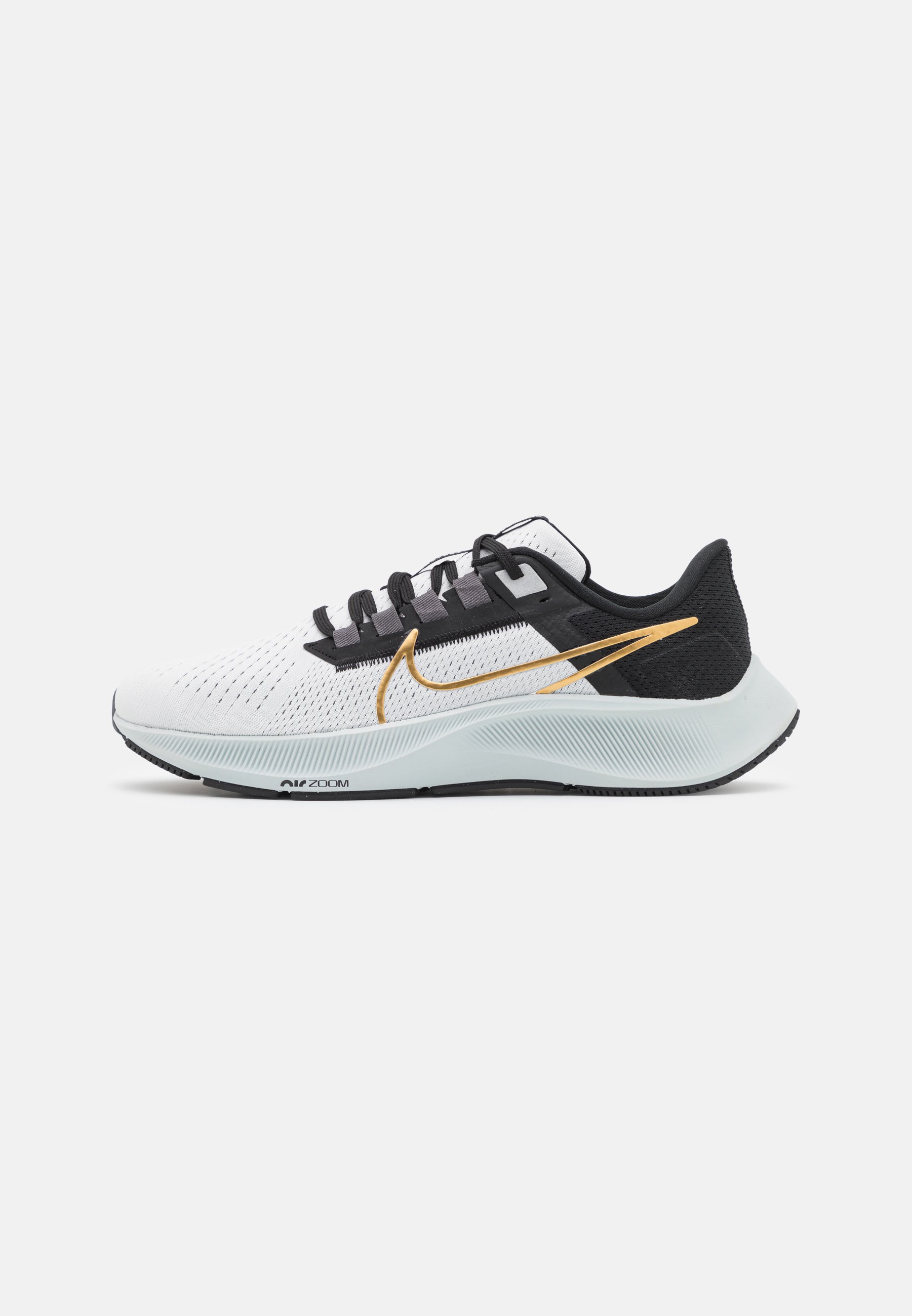 gold and black nike running shoes