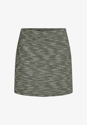 Mini falda de textura en blanco y negro con corte recto, que presenta un sutil patrón textil y una superficie suave. Sin herrajes visibles.