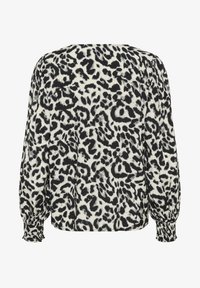 Sélectionné, white black leopard